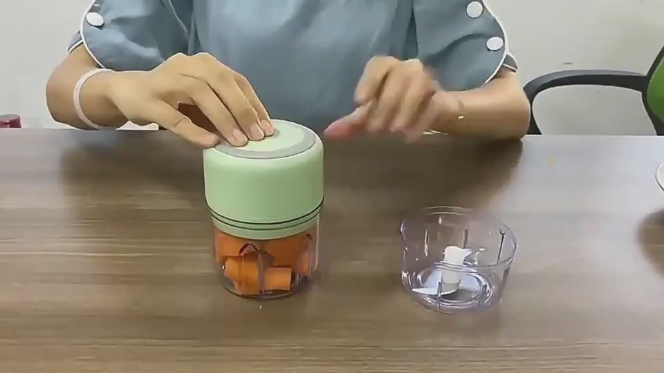Mini electric garlic chopper for kitchen food preparation